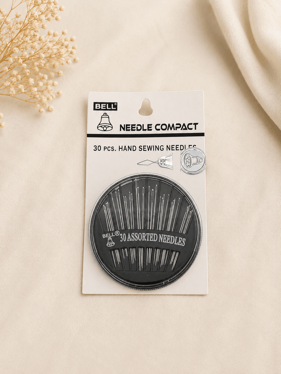 assorted hand sewing needles